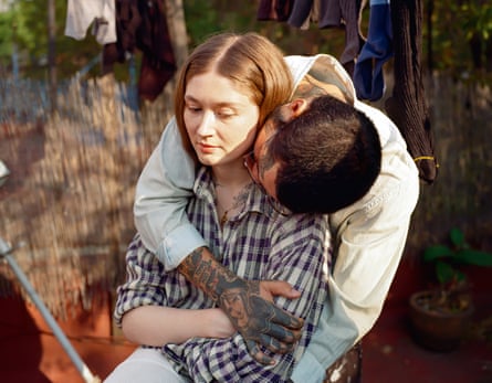 Jiménez rests his head on Auclair’s shoulder as he hugs her