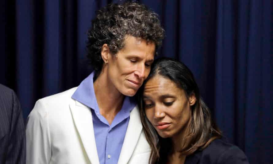 Andrea Constand embraces prosecutor Kristen Feden during a news conference after Cosby was found guilty in 2018.