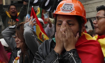 Opponents of Morales celebrate his resignation in La Paz.