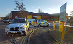 Police cars in a road in leeds