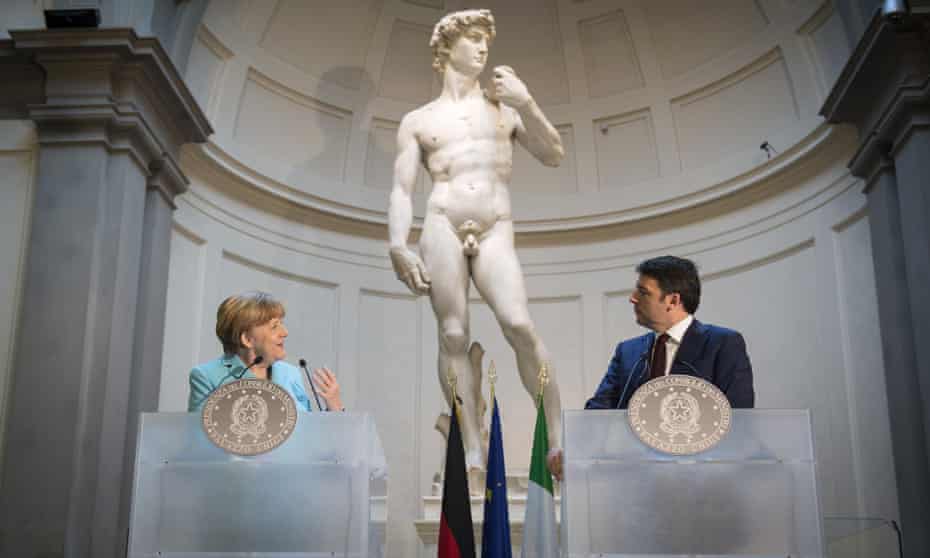 German Chancellor Angela Merkel and Italian Prime Minister Matteo Renzi hold a press conference in front of Michelangelo's statue of David