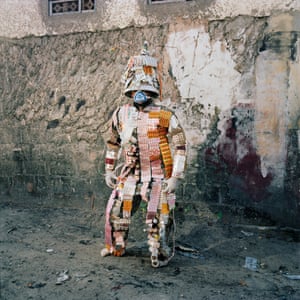 Congolese artist Florian Sinanduku posing in his pill costume in Selembao district, Kinshasa (Democratic Republic of Congo). “In Kinshasa, and in the whole country, finding medicine is still a big issue. You never know where it comes from and what it is made of. You can find pills everywhere, but most of them are coming from China, and came here without any control”, says Florian Sinanduku.