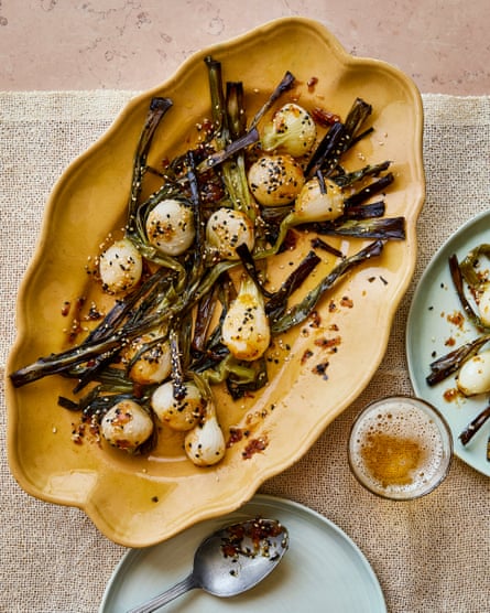 Sabrina Ghayour’s sticky glazed spring onions with sesame.