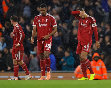 Liverpool’s players show their disappointment aft going 2-0 down astatine Manchester City this month