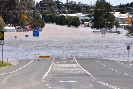 Brown water covering a highway