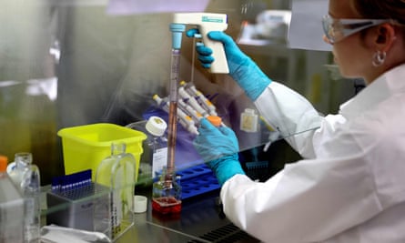 A technician works on a research process to find new CAR T-cells at a laboratory in Paris.