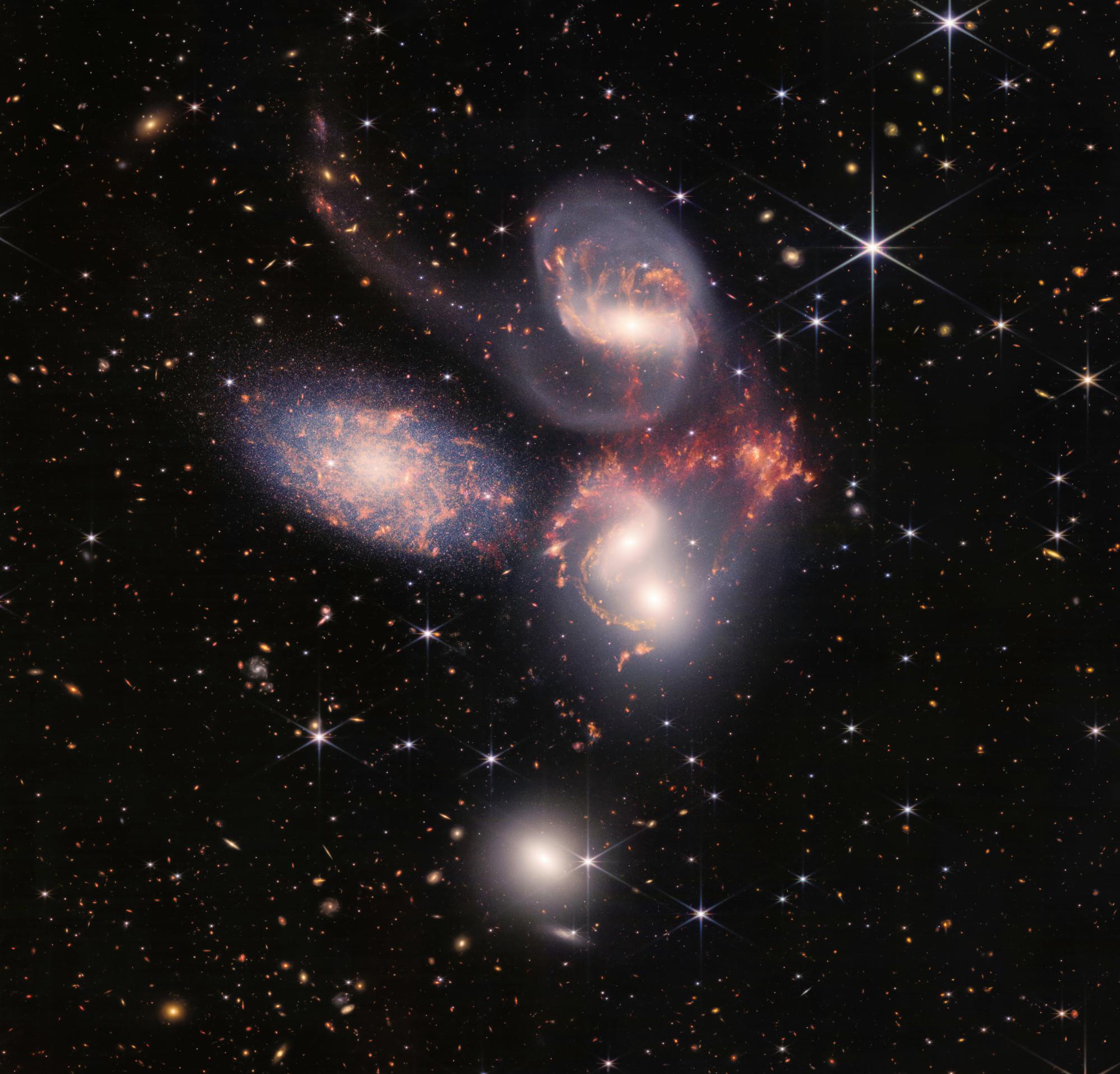 Stephan’s Quintet, a visual grouping of five galaxies.