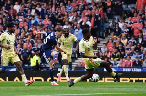 Scotland’s Findlay Curtis fires home a left foot shot to put the home side back on level terms.