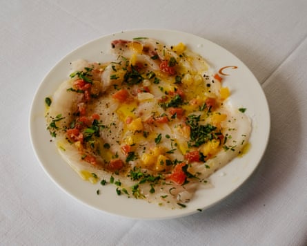 'Sweet and sharp in exactly the right proportions': Café Clement's sea bass carpaccio.