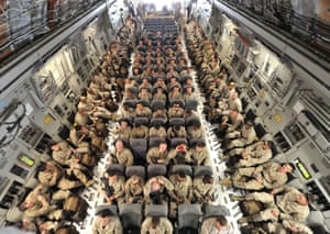 US service personnel on a plane bound for Afghanistan