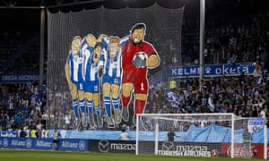 Alavés fans prepare to watch their team beat Real Madrid in La Liga.