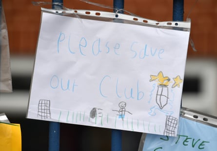 A handwritten note on the gates at Gigg Lane.