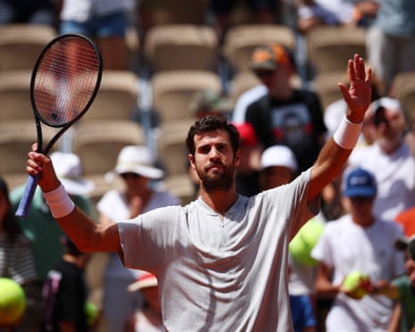 Khachanov celebrates winning his first round match against Gea.