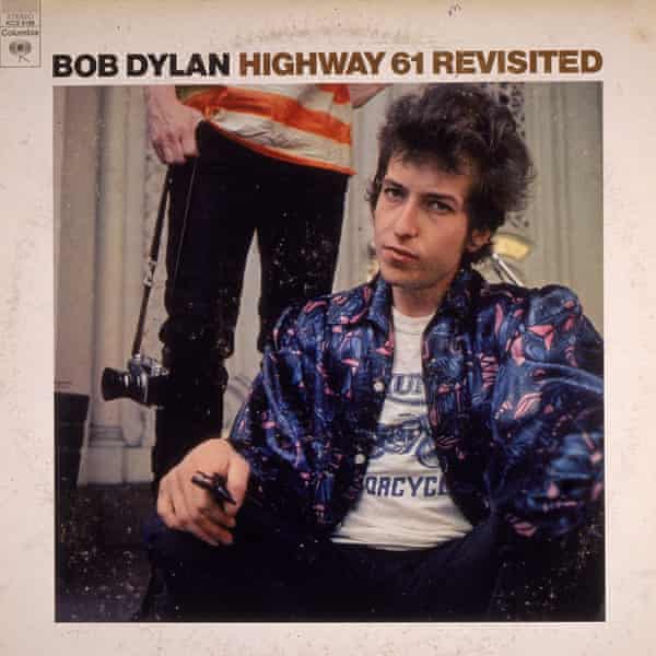 The cover of Bob Dylan’s 1965 album Highway 61 Revisited, with Neuwirth in orange-and-white T-shirt.