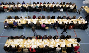 Counting of early votes under way in Bern in Switzerland on Saturday. 