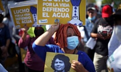 Environmentalists mark World Water Day in San Salvador holding posters that read: ‘I fight for life, I defend water’, while one marcher holds a picture of slain Indigenous environmental activist Berta Caceres.