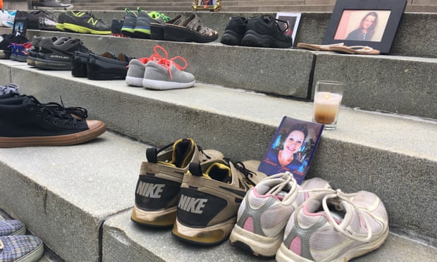 Shoes of those who died of an opioid overdose on the steps of the West Virginia Capitol in Charleston. Cabell county, in the state, was considered the centre of the opioid epidemic in the US.