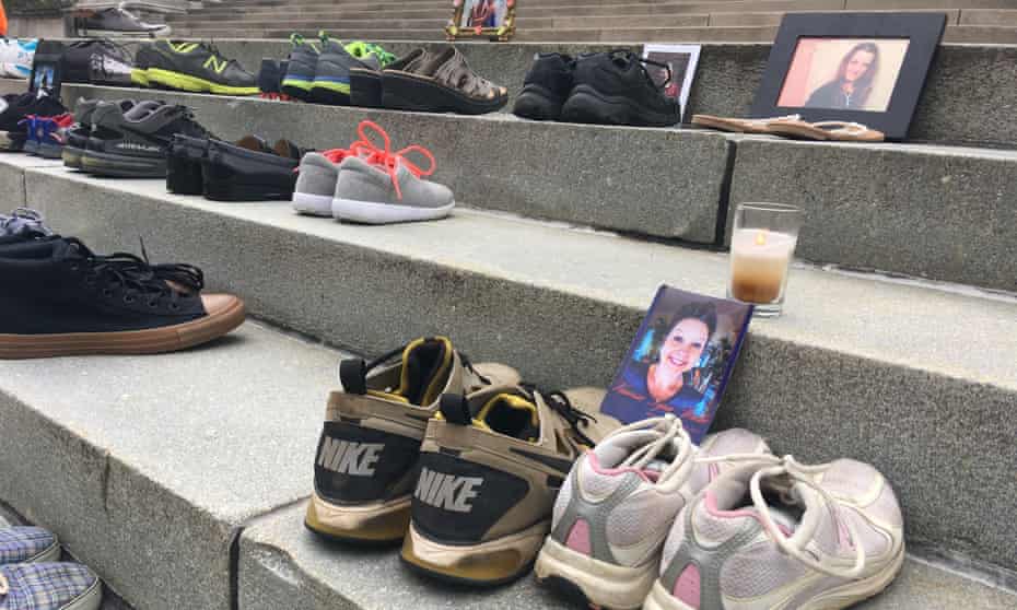 Shoes of those who died of an opioid overdose on the steps of the West Virginia Capitol in Charleston. In the US more than 60,000 people died of opioid overdoses in 2016 alone.