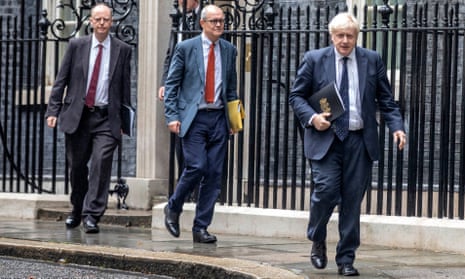 L to R: Chief medical officer for England Chris Whitty, UK chief scientific adviser Patrick Vallance and then PM Boris Johnson walk to a Downing Street press conference on 14 September, 2021. 