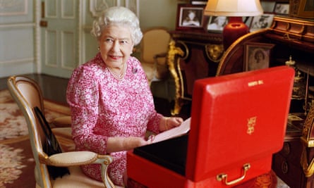 Queen Elizabeth at her desk in her private audience room in Buckingham Palace