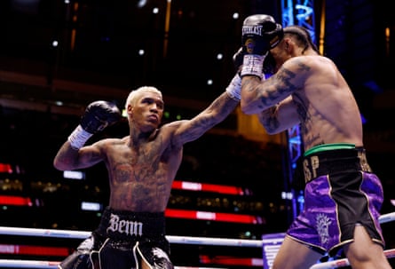Conor Benn fires a left hand at Regis Prograis.