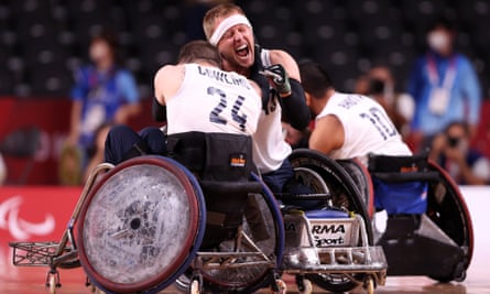Aaron Phipps and Ryan Cowling of Team GB celebrate after defeating the United States during the gold medal wheelchair rugby match on day 5 of the 2020 Tokyo Paralympic Games at Yoyogi National Stadium