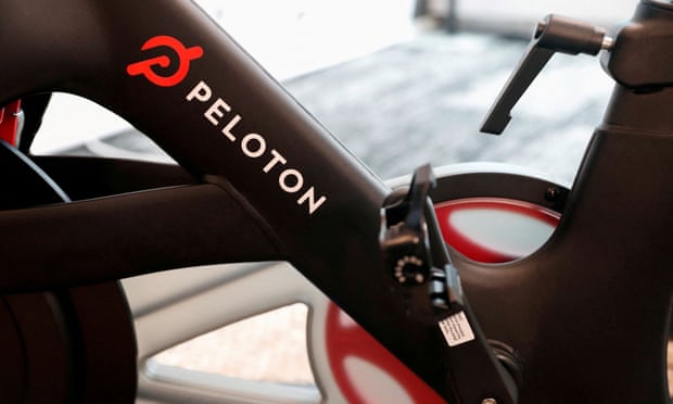Close-up image of the logo on a black Peloton bike.