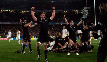 Kieran Read (centre) celebrates with teammates as the final whistle sounds giving New Zealand an 8-7 victory against France in the 2011 Rugby World Cup final