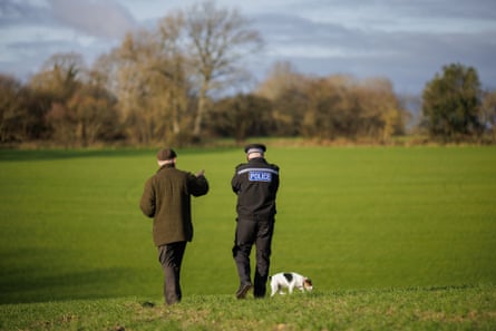 Lemon with a farmer examining damage to his land