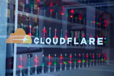 Cloudflare OutageFILE - Lava lamps are seen through a lobby window at the headquarters of Cloudflare in San Francisco, Wednesday, Aug. 31, 2022. (AP Photo/Eric Risberg, File)