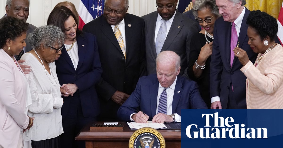 Biden signs bill marking Juneteenth as federal holiday celebrating end of slavery in US – video