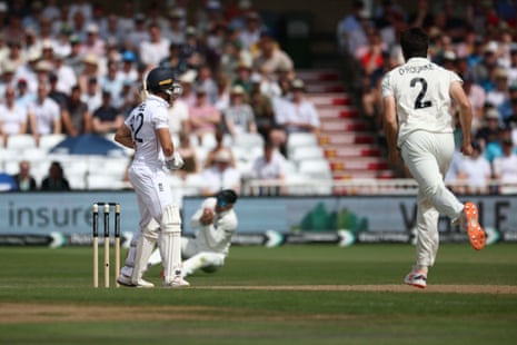 England's Jacob Bethell edges to slip off New Zealand's Will O'Rouke.