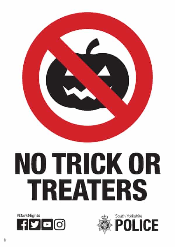 A poster showing a pumpkin crossed out like a no-entry sign with the text 'no trick or treaters' and the South Yorkshire police logo