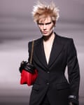 Red leather and high-voltage hair.