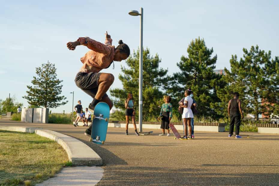 Marcia Mijnhijmer, a skater from the Netherlands who is part of the Melanin Skate Gals and Pals, ollies during a session with other skateboarders in the community