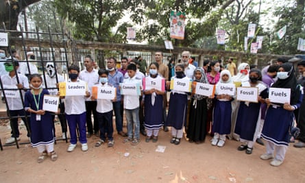 Young demonstrators take part during a climate change strike in Dhaka, Bangladesh, to demand that world leaders be imprisoned for not taking environmental measures that affect the world.