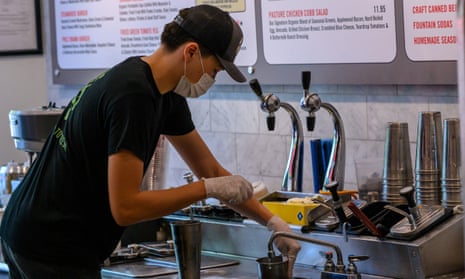 An 11th grade student works in a fast food restaurant in Arlington, Virginia. He started working there at age 16 when his father lost his job. 