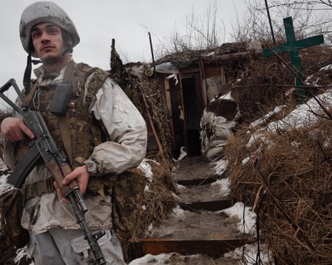 Ukrainian Paratroopers Living In Trenches Along The Frontline Amid Talks Of A Russian Invasion<br>AVDIYIVKA, UKRAINE - FEBRUARY 08: Denis, 23 years-old, soldier in the 25th Airborne Brigade of Ukrainian army on February 8, 2022 in Avdiyivka, Ukraine. Servicemen of the 25th Airborne brigade of the Ukrainian army stationed in the trenches around the city of Avdiyivka, Donetsk region, Donbass. Tensions between the NATO military alliance and Russia are intensifying due to Russia's move of tens of thousands of troops as well as heavy weapons to the Ukrainian border, causing international fears of a possible Russian invasion of Ukraine. (Photo by Gaelle Girbes/Getty Images)