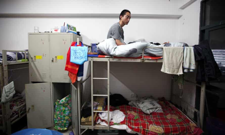 a worker rests in a dormitory at foxconn shenzhen