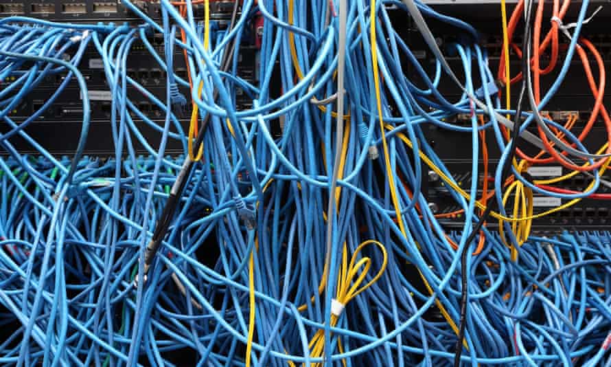 Network cables are plugged in a server room in New York City. 