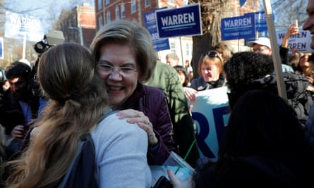 Elizabeth Warren greets supporters as she walks to her polling place in Cambridge, Massachusetts, on 3 March.
