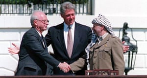Yitzhak Rabin and Palestinian leader Yasser Arafat with President Clinton, sealing the Oslo accords with a handshake, in September 1993 on the White House lawn