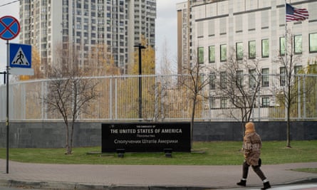 A woman walks past the US embassy in Kyiv.