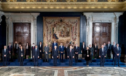Sergio Mattarella, centre left, and Mario Draghi, centre right, during the new government’s swearing-in ceremony in Rome