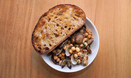 ‘Butched up with ’nduja’: clams with chickpeas.