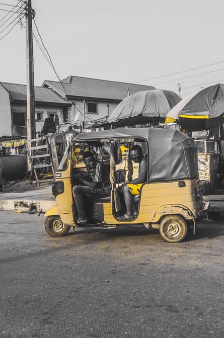 An auto-rickshaw outside the market in Orile.