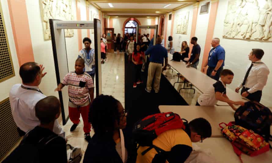 Students pass through metal detectors on their way into school in Albany, New York.