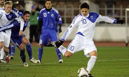 Jari Litmanen, aged 39, scores from the spot against San Marino in his last game for Finland