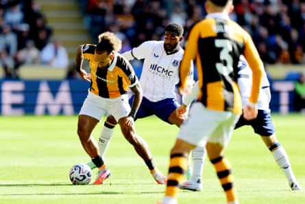 Ainsley Maitland-Niles tracks the ball