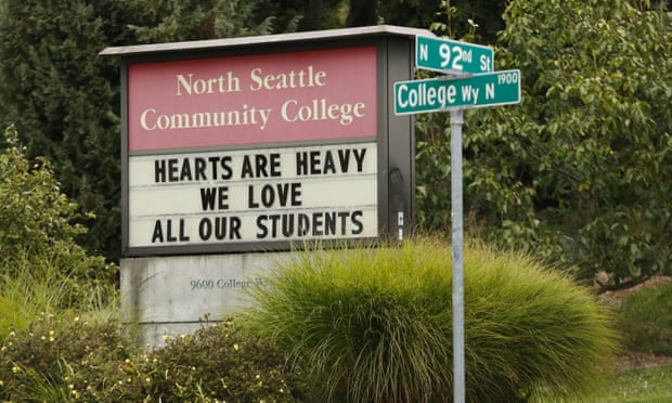 A sign at North Seattle Community College acknowledges the deaths of four international students.